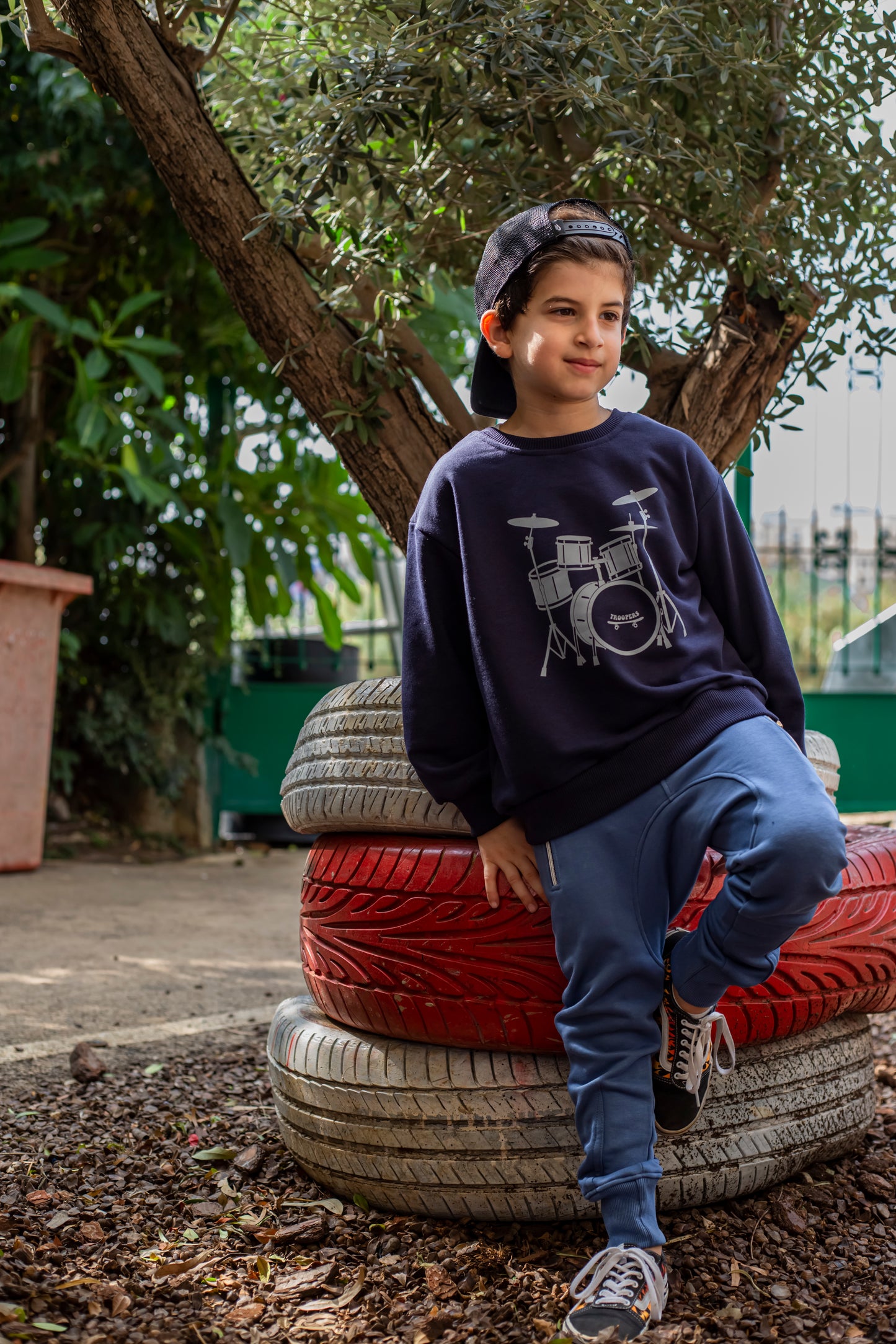 Feel the rhythm and pulse of music with the Drums Cotton Sweater - Navy